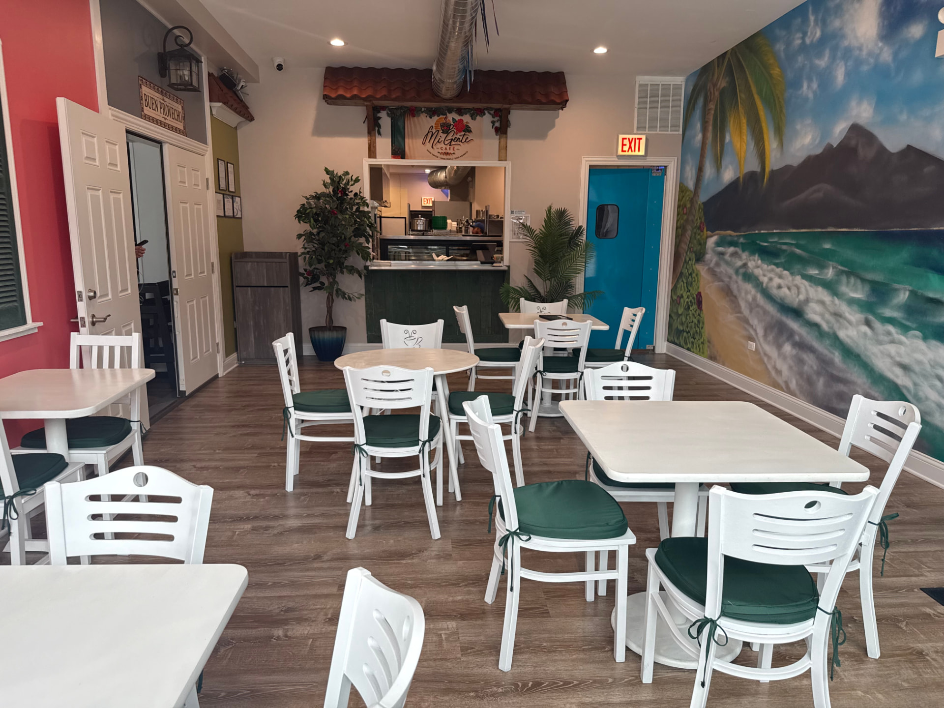 The colorful dining room inside Mi Gente Café